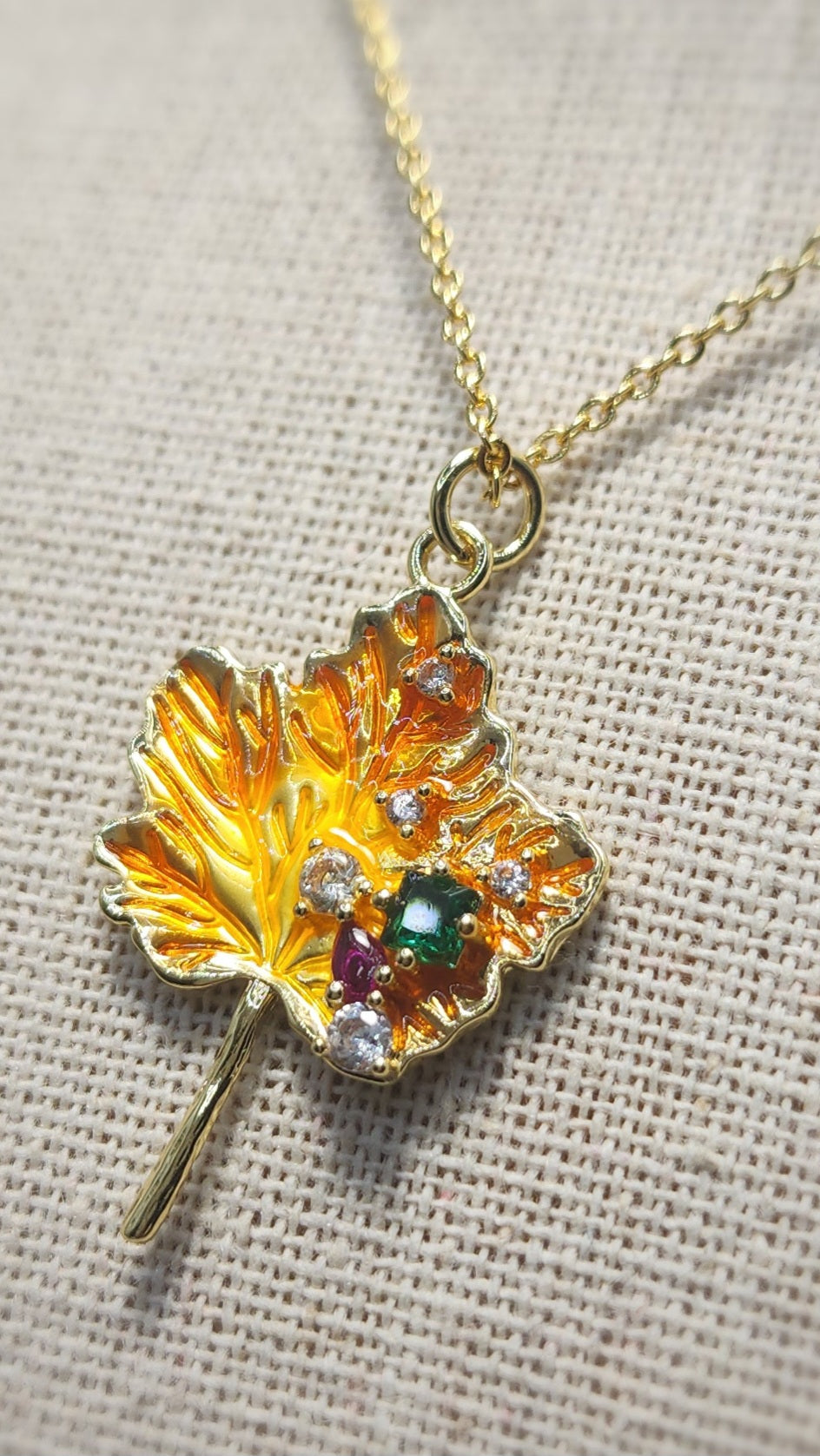 Maple leaf charm 18k gp chain
