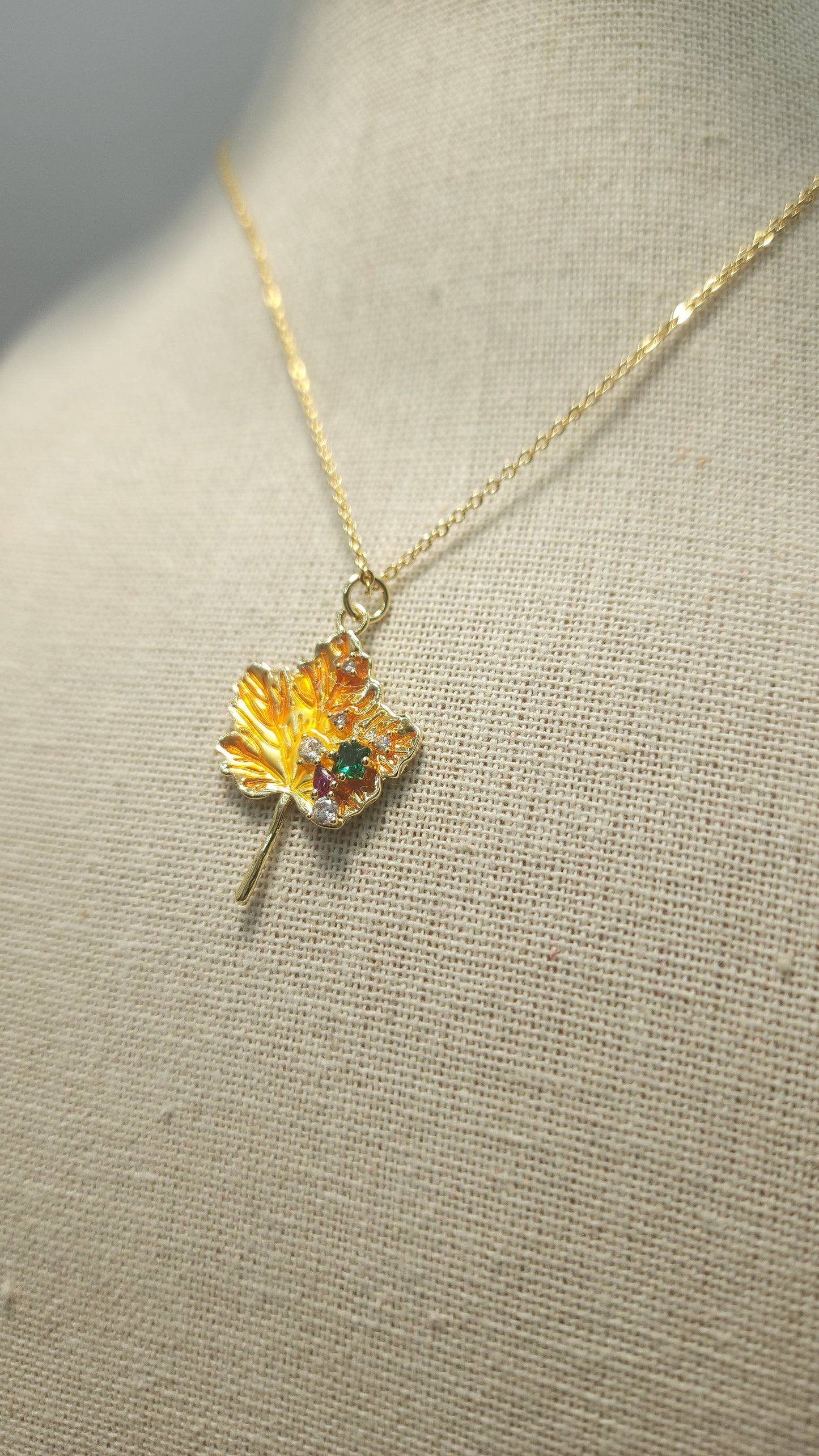 Maple leaf charm 18k gp chain